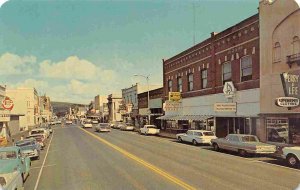 Street Scene Cars Walgreens Western Auto Signs Colfax Washington 1960s postcard