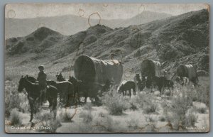 Arcade Card 1950s Covered Wagon Train Cowboys on Horses Western Scene