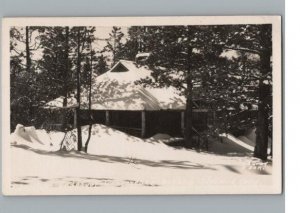 RPPC Postcard Snowy Cabin Pine Trees Winter Scene 1950s