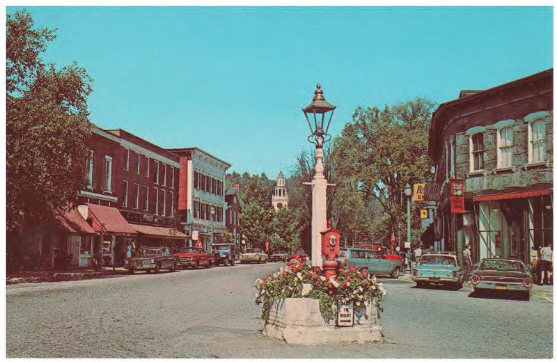 WOODSTOCK, VERMONT AT ELM AND CENTRAL  FORD T-BIRD, EDSEL PARKED 1950s POSTCARD
