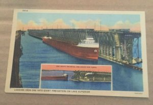 VINTAGE POSTCARD UNUSED LOADING IRON ORE INTO GIANT FREIGHTERS ON LAKE SUPERIOR