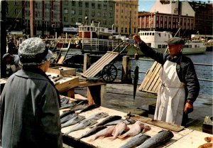 Greetings from Bergen's vibrant fish market! Happy travels!! postcard