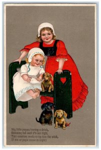 PFB Postcard Children Little Girl Feed Bottle Milk Puppy Dogs Embossed c1910's