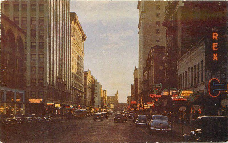 Autos 1950s SPOKANE WASHINGTON Night Neon Riverside Avenue Roberts postcard 4847