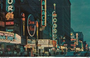 MONTREAL , Quebec , Canada , 1950-60s ; St. Catherine St. at night