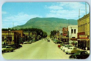 Cody Wyoming WY Postcard Main Street Business Rattlesnake Mountain c1960 Vintage