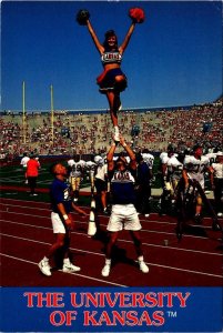 KS, Lawrence UNIVERSITY OF KANSAS Cheerleaders Performing FOOTBALL 4X6 Postcard