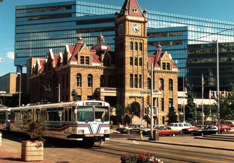 CONTINENTAL SIZE POSTCARD CALGARY ALBERTA CITY HALL AND LRT C-TRAIN STREET SCENE