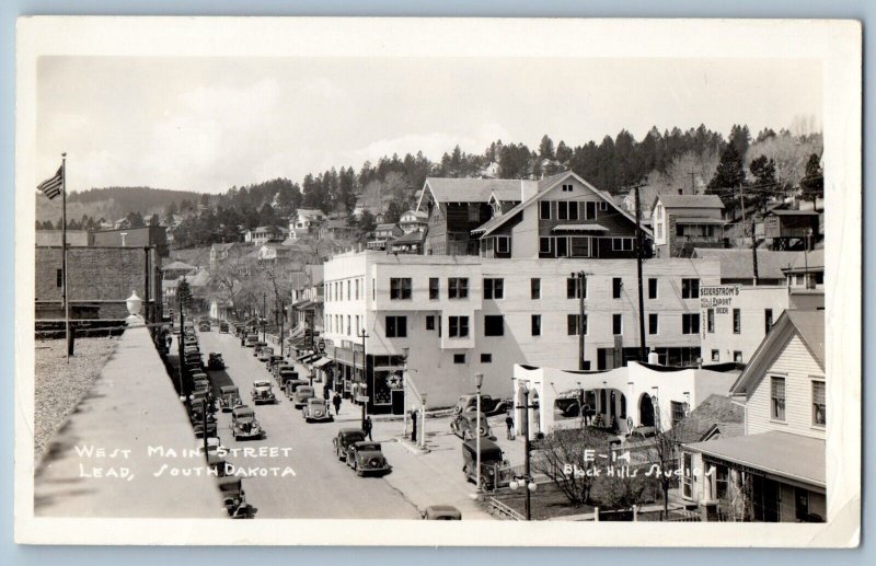 Lead South Dakota SD Postcard RPPC Photo West Main Street Cars Motor Oil c1940's