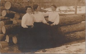 RPPC Postcard Women Sitting on Giant Logs Early 1900s