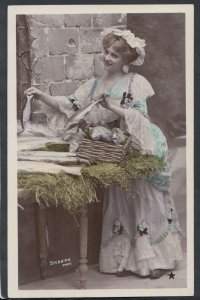 Theatrical Postcard - Actresses - Costumed Lady at a Fish Stall  RS15020