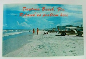 Vintage Postcard Relaxin no problem here Daytona Beach FL Beach Scene