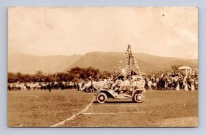 RPPC PARADE FLOAT CAR SCHOFFIELD BARRACKS (?) HAWAII REAL PHOTO POSTCARD 1910