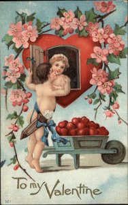 Valentine Fantasy Cupid Kisses Little Girl in Heart Window c1910 Postcard