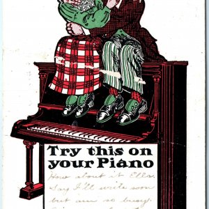 c1910s Try this on your Piano Kiss Make Love Comic EB&E UDB Art Postcard A153