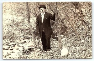 c1910 MAN IN TUXEDO STANDING BESIDE CREEK IN WOODS PHOTO RPPC POSTCARD P3671