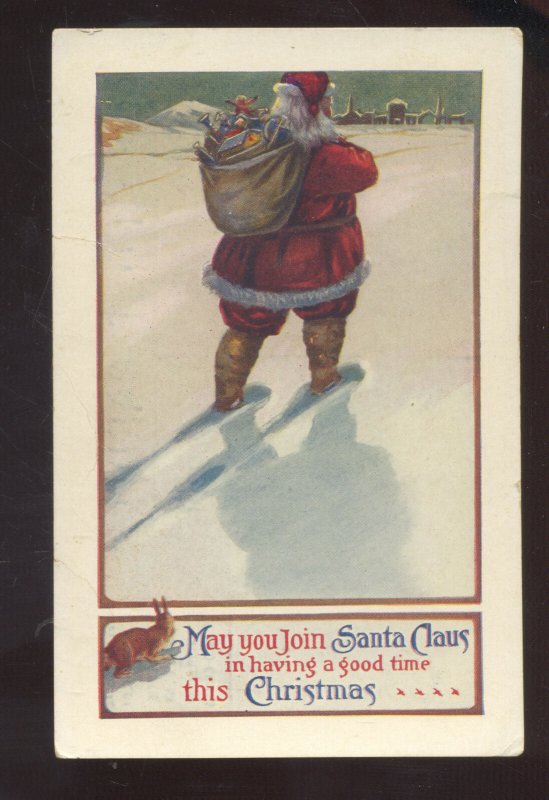 SANTA CLAUS SACK OF TOYS LARGE RED ROBE RABBIT VINTAGE CHRISTMAS POSTCARD