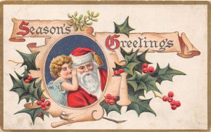 J34/ Santa Claus Christmas Postcard c1910 Child Whisper Holly 190