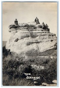 Wyoming WY RPPC Photo Postcard Scenery Sitting at Rocky Formation Badlands 1912