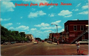 Postcard KS Phillipsburg downtown street Coke woman cars