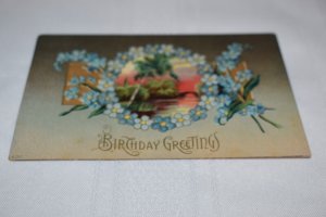 Birthday Greetings Blue Flowers Landscape Scene Embossed Postcard
