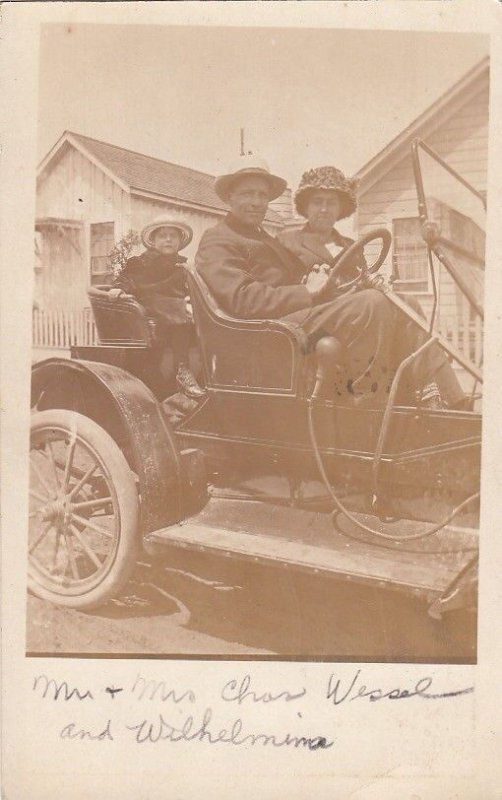 RPPC Postcard Man Woman + Girl Driving Antique Car c. 1920s