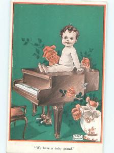 Pre-Linen Baby Grand signed BABY IS SITTING ON GRAND PIANO AC1741