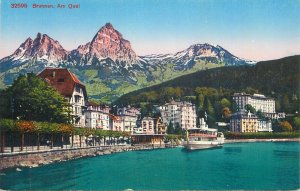 Switzerland navigation & sailing topic postcard Brunnen quai cruise ship paddle
