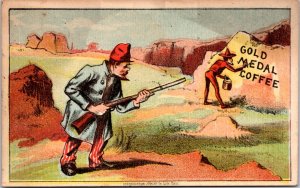 Trade Card - Gold Medal Coffee -  Soldier with gun and man painting on rock