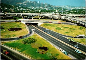 CONTINENTAL SIZE POSTCARD MOTOR HIGHWAY JUNCTION AT CARACAS VENEZUELA 1970s