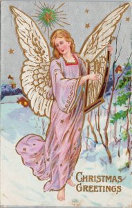 Christmas Greetings Woman Angel Wings Harp Xmas c1909 Embossed Postcard H5