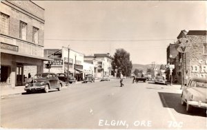 RPPC, Elgin OR Oregon  STREET SCENE Gas~Stores~50's Cars UNION COUNTY  Postcard