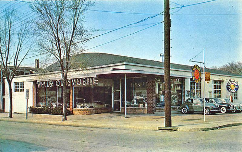 Port Jefferson NY Robert Wells Oldsmobile Dealership Cars Postcard