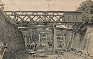 BRITISH SOLDIERS BUILDING A BRIDGE IN FRANCE?~MILITARY REAL PHOTO POSTCARD