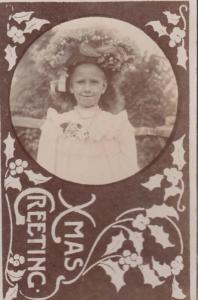 Antique Christmas Greetings Girl With Crazy Flower Tall Hat Fashion RPC Postcard