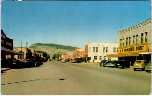 CODY, WY Wyoming 1958   STREET SCENE  VR Trading Post    Cars    Postcard