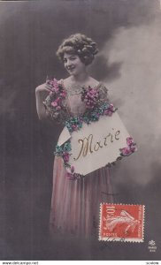 RP; Pretty Lady wearing Pink gown with flowers holding sign Marie, 1900-10s