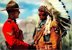 VINTAGE CONTINENTAL SIZE POSTCARD MOUNTIE AND INDIAN CHIEF