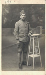 World War 1 Military Soldier Posing by a Stool Vintage RPPC 07.92