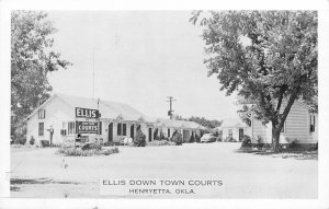 Postcard 1950s Oklahoma Henryetta Ellis Down Town Courts auto occupation 24-4962