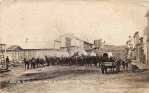 H57/ Buffalo North Dakota RPPC Postcard c1916 Frontier Town Wagons Stores 79