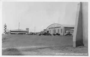 J77/ Billings Montana RPPC Postcard c1940-50s Airport Hangar Trucks   17