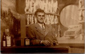 Real Photo Postcard Man Posing in Photo Studio Bar~3078