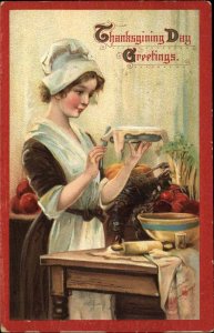 Brundage Thanksgiving Pretty Young Girl Pilgrim Baking Pie c1910 Postcard