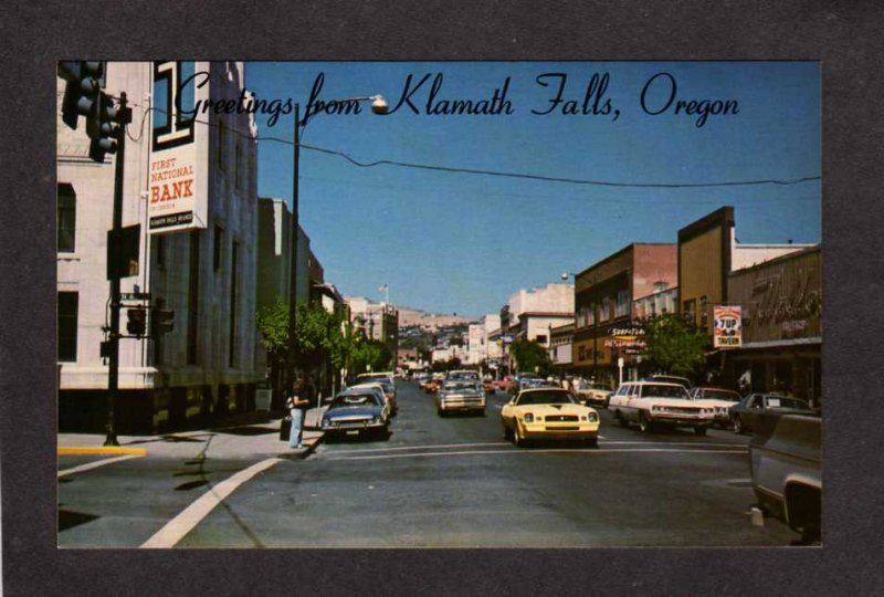 OR Greetings From Klamath Falls Oregon Postcard First National Bank 7 UP Tavern