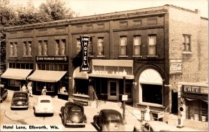 Real Photo Postcard Street Scene and Hotel Lane in Ellsworth, Wisconsin