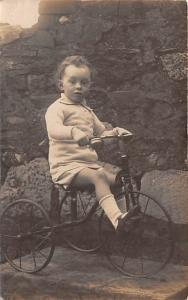 Child on tricycle Child, People Photo Unused 