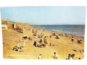 Families Relaxing on the Beach Highcliffe on Sea Dorset Vintage  Postcard 1967