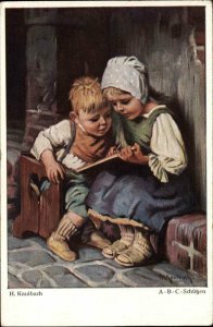 H. Kaulbach Little German Girl Teaches Brother to Read c1910 Vintage Postcard