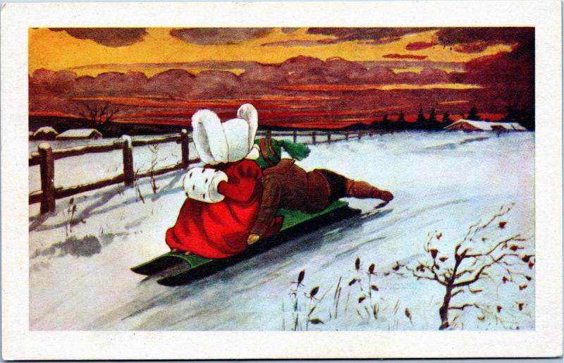 Christmas postcard - Children on sled in country